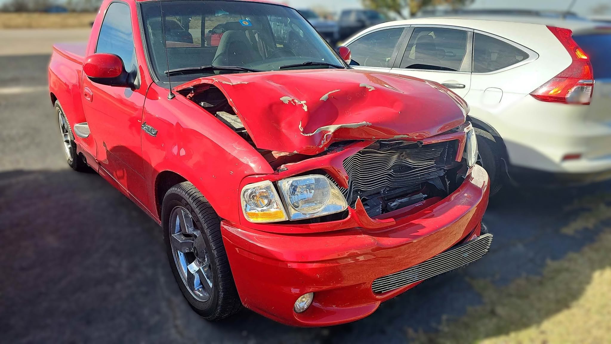 Toyota Camry front-end collision damage before repair